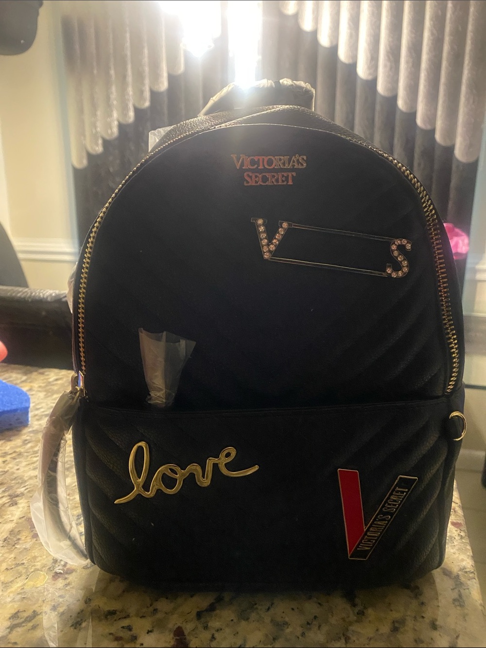 Victoria's Secret Black Quilted Mini Backpack with Gold Accents